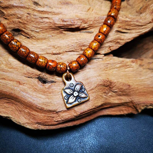 Yak Bone Carved Flower Prayer Bead Pendant - Tibetan Buddhist art, front view