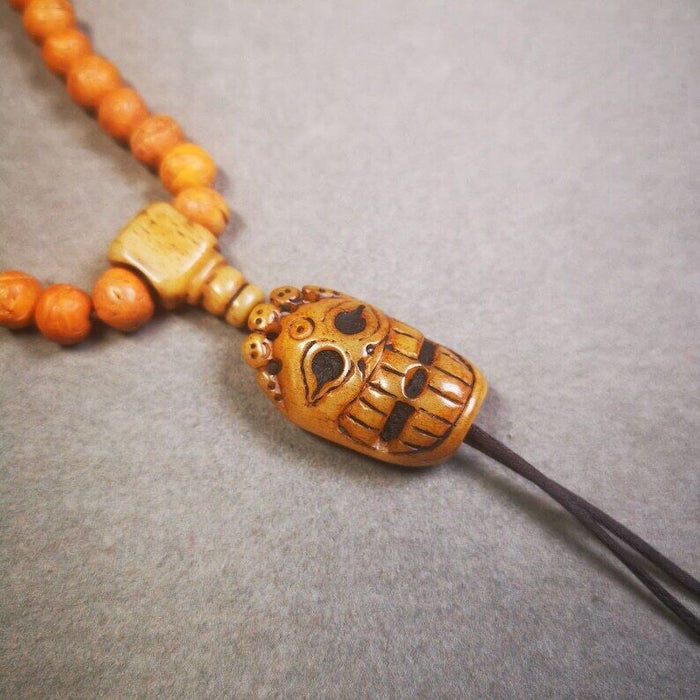 Yak Bone Carved Mahakala Amulet for Mala,Necklace Pendant,1.18" - Tibetan Buddhist mala beads, front view