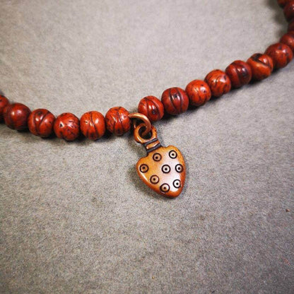 Yak Bone Carved Mantra Dot Prayer Bead Pendant - Tibetan Buddhist art, front view