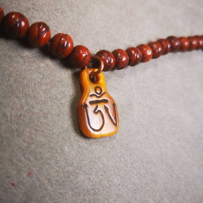 Yak Bone Carved Prayer Bead Pendant 0.98" - Tibetan Buddhist art, detailed view