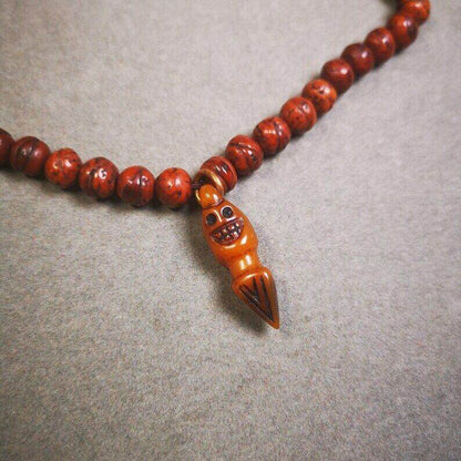 Yak Bone Carved Skull Phurba Amulet, Ritual Implement Pendant - Tibetan Buddhist amulet, front view