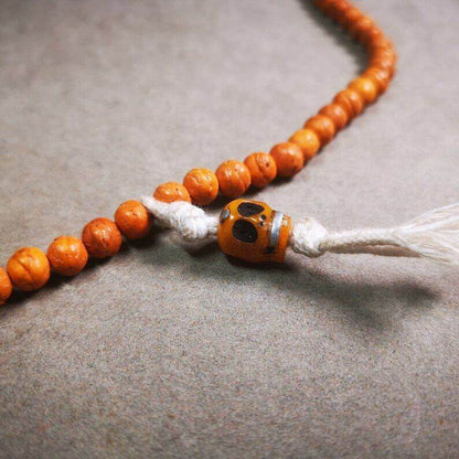 Yak Bone Carved Skull Prayer Bead Pendant,Bead Counter Clip Amulet for Mala - Tibetan Buddhist mala beads, close-up detail