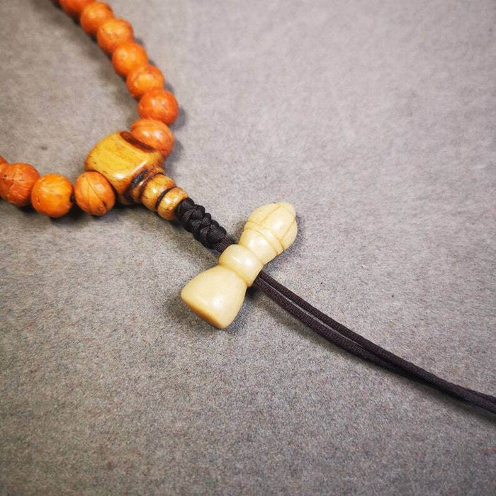 Yak Bone Carved Vajra Bell Amulet Pendant,Spacer Bead for Mala - Tibetan Buddhist mala beads, detailed view