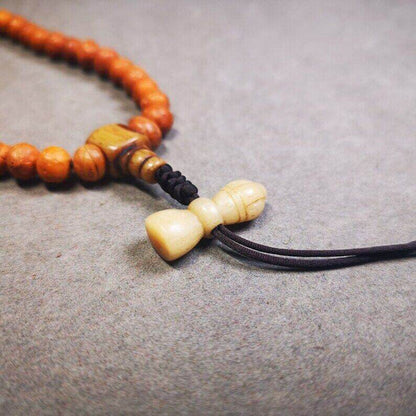Yak Bone Carved Vajra Bell Amulet Pendant,Spacer Bead for Mala - Tibetan Buddhist mala beads, close-up detail