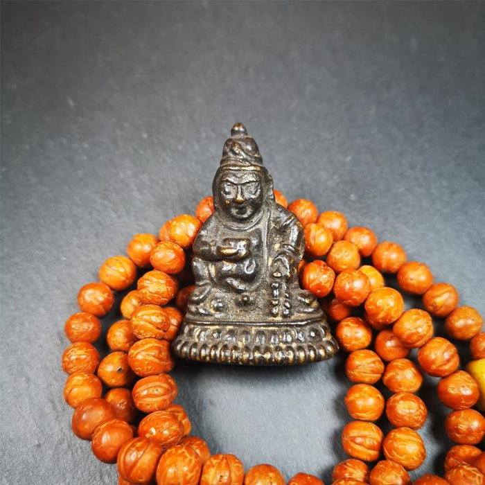 Yellow Jambhala 1.97" - Tibetan Buddhist statue, close-up detail
